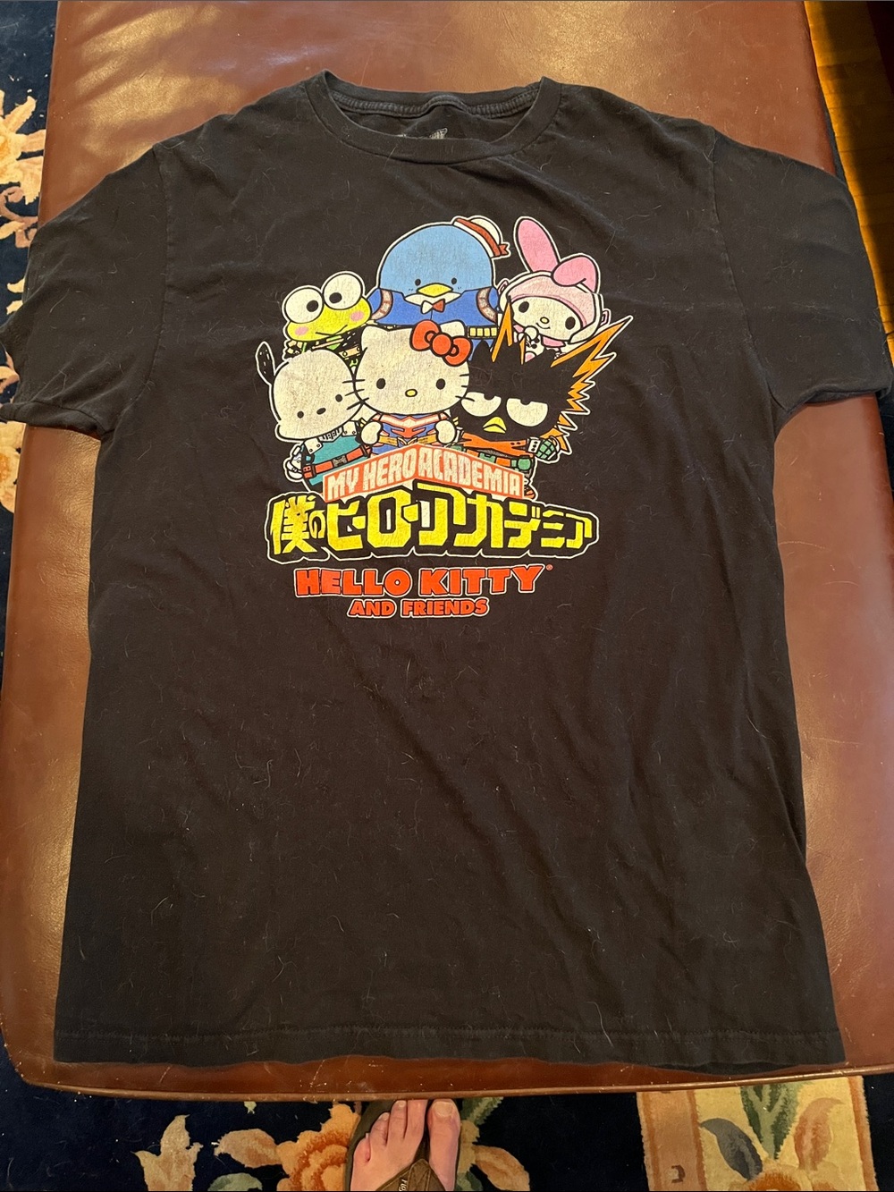 Sanrio Black Graphic Tee with Blue Character Artwork